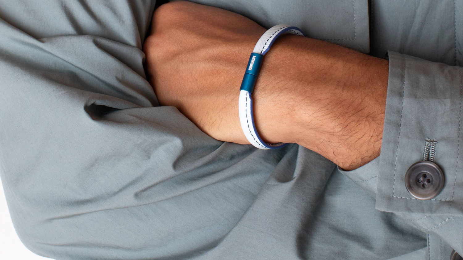 Stylish guy wearing a MANIMIRI Spring Light Blue bracelet in leather